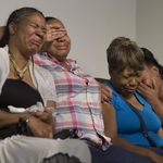 From left, Esaw Garner, wife of Eric Garner, daughter Emerald Garner, mother Gwen Carr, and sister Ellisha Flagg, cry during a rally at the National Action Network headquarters<br/>